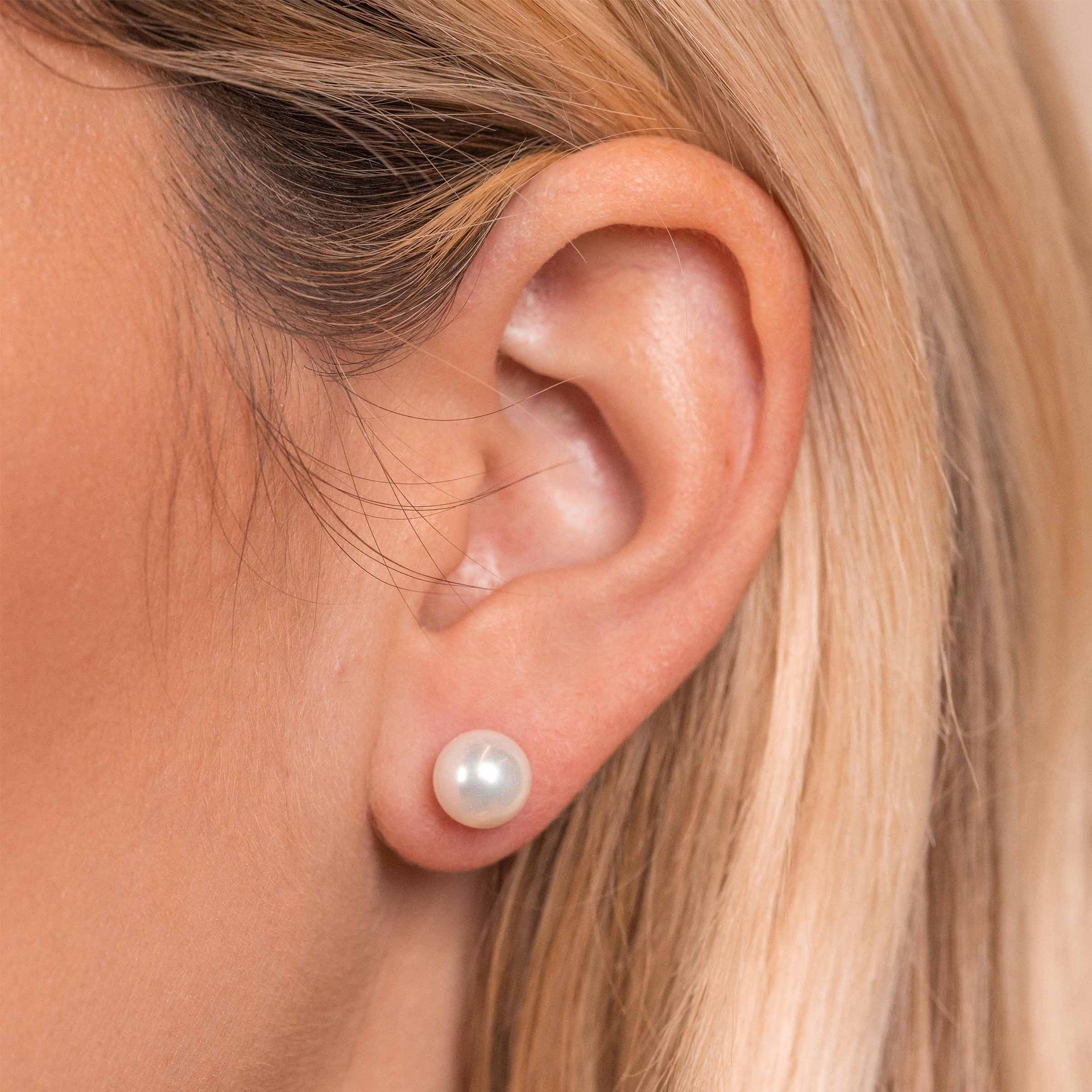 Womens pearl earrings on model