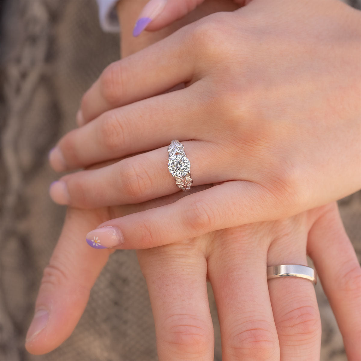 Unique silver engagement ring on model