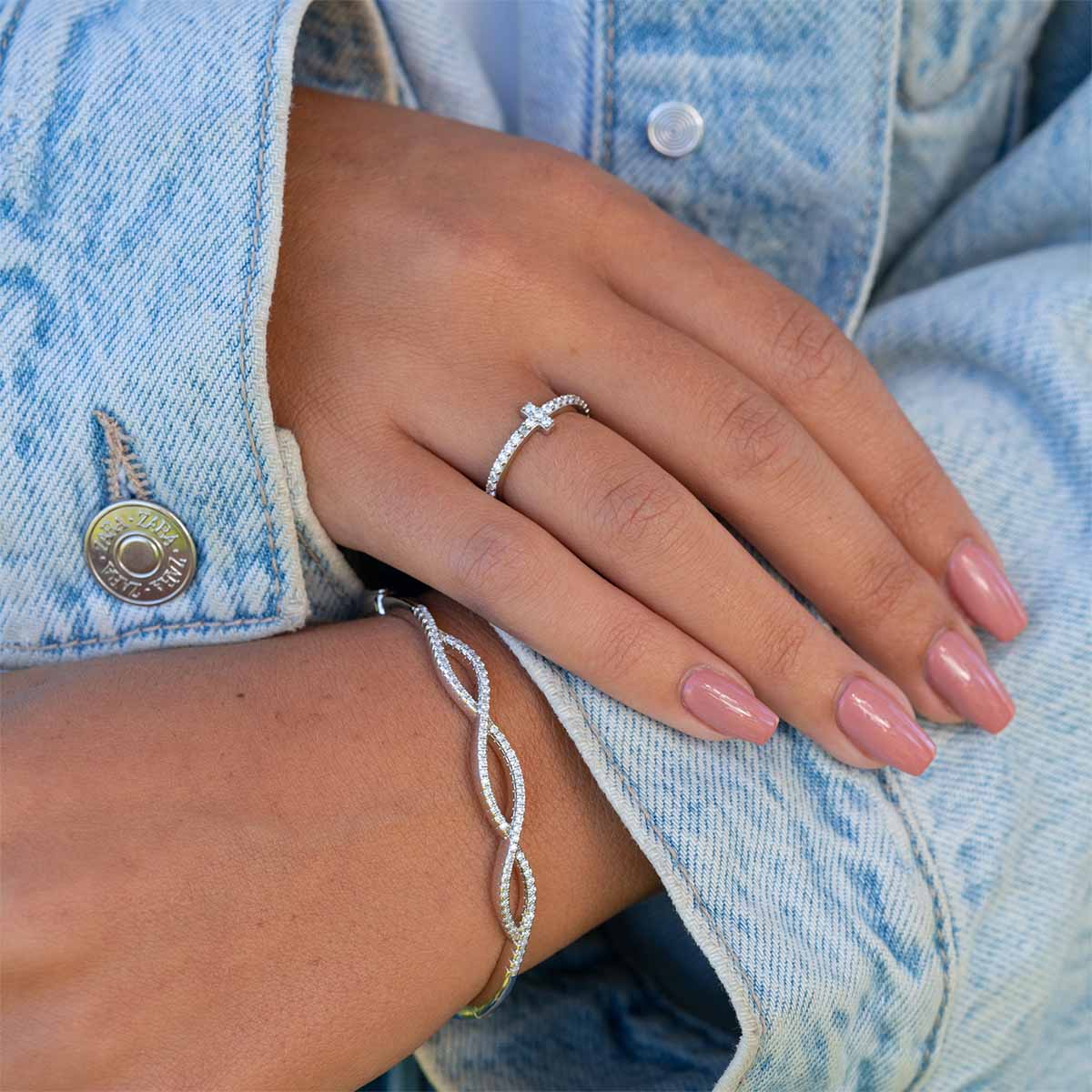 Cute silver twisted bracelet on wrist