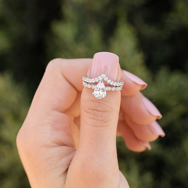 the scarlett vintage pear cut engagement ring paired with wedding band
