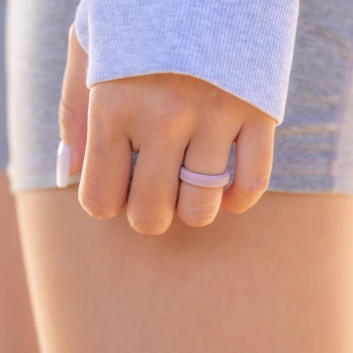 Woman wearing unique silicone ring with beveled edges