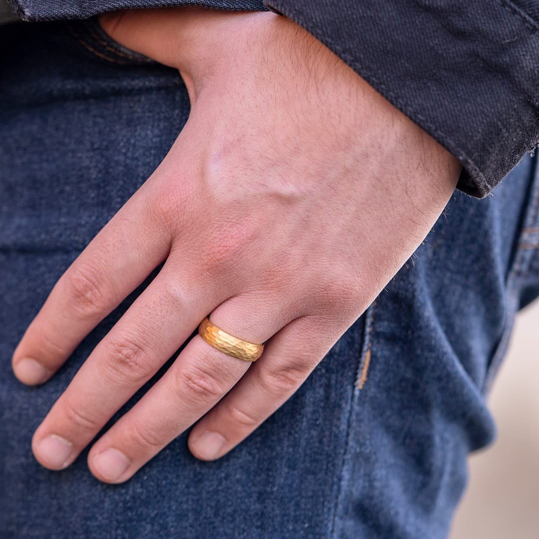 mens gold ring on hand