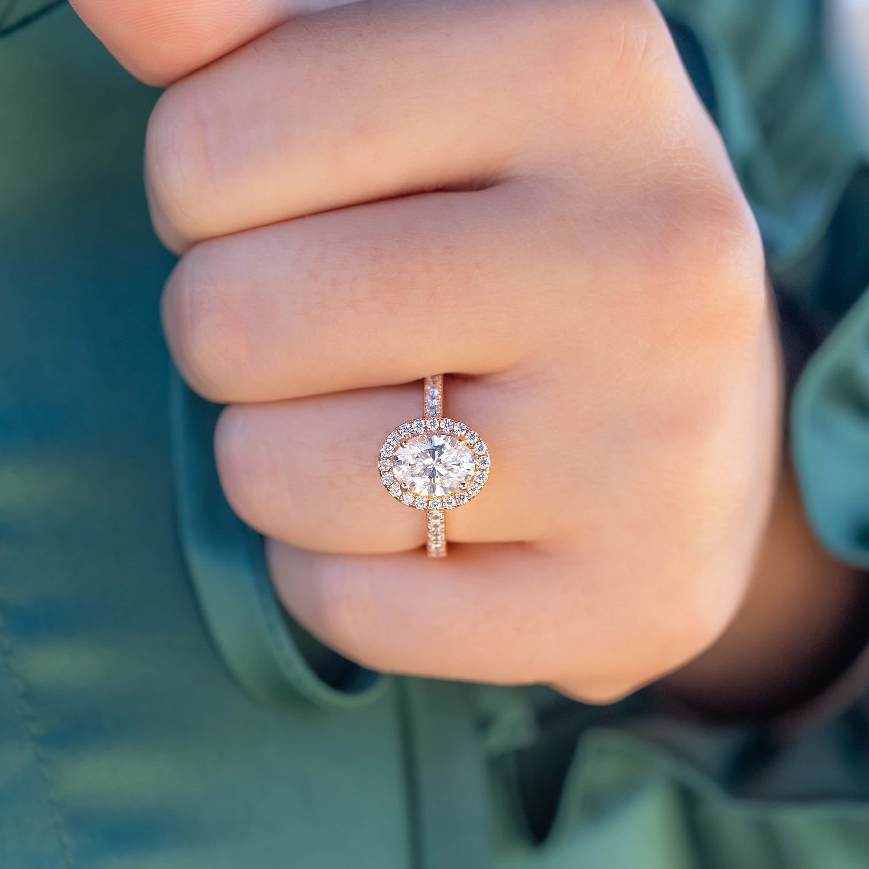 Rose gold oval on sale shaped engagement ring