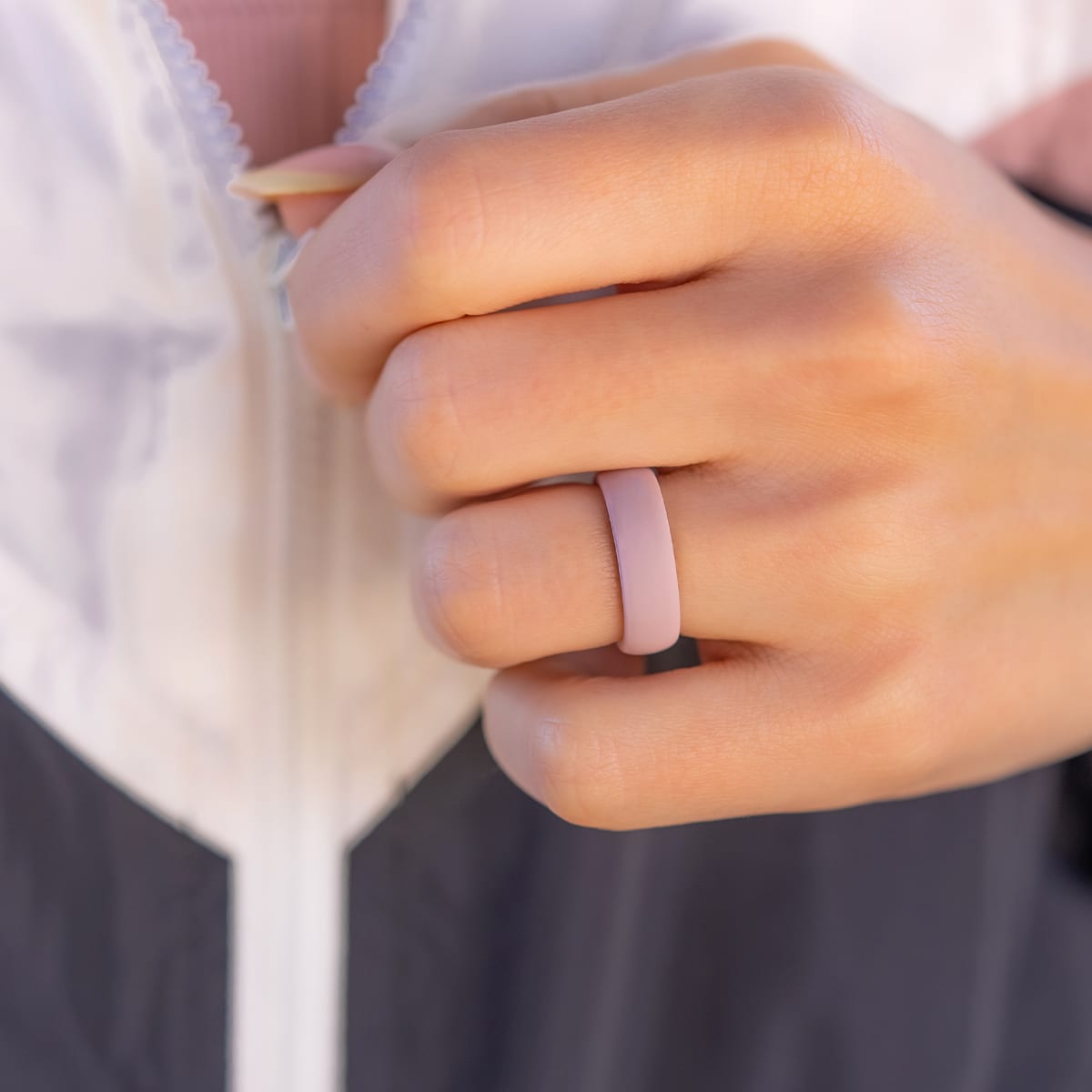 Flexible and versatile rubber wedding band worn by a woman