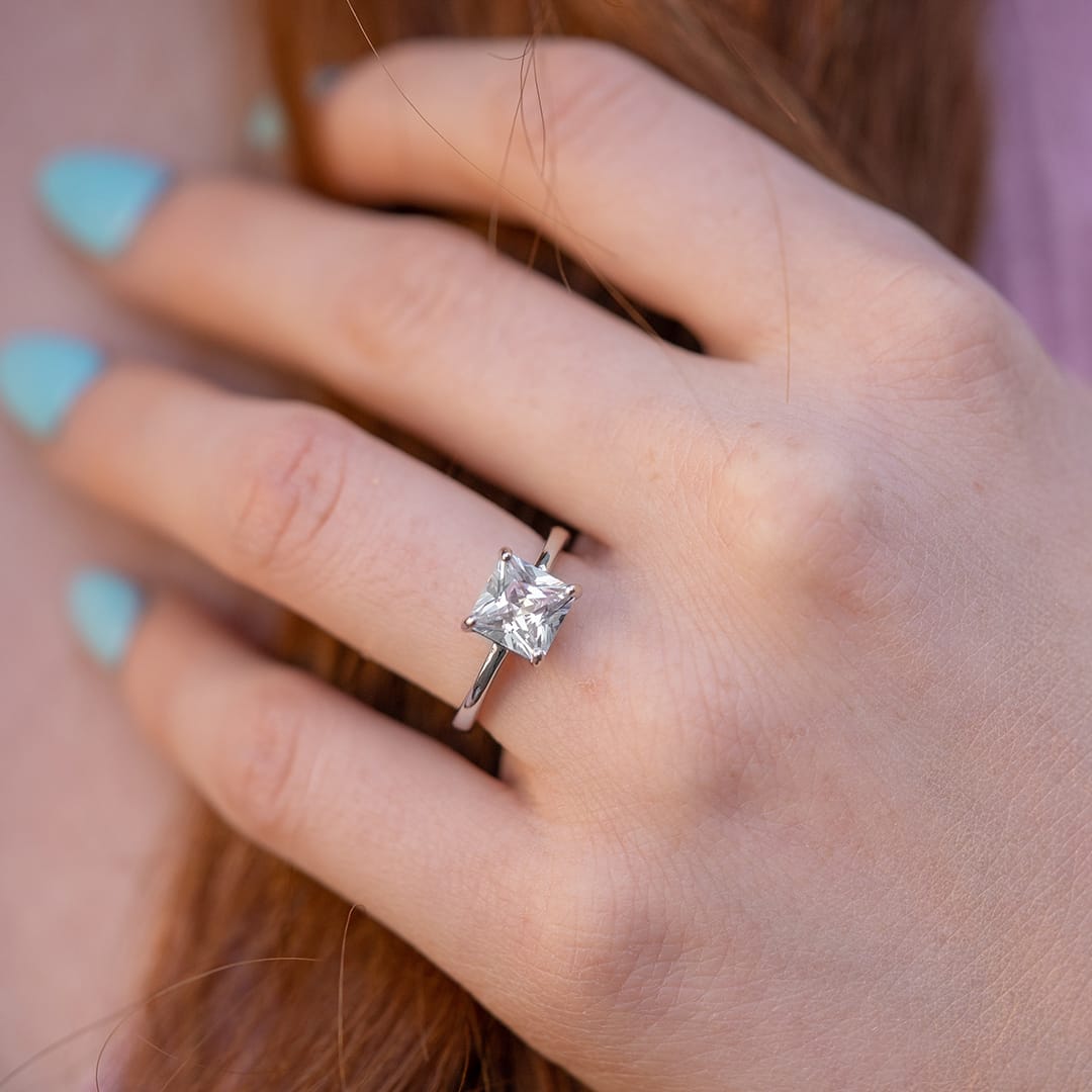 the olivia silver princess cut engagement ring on hand